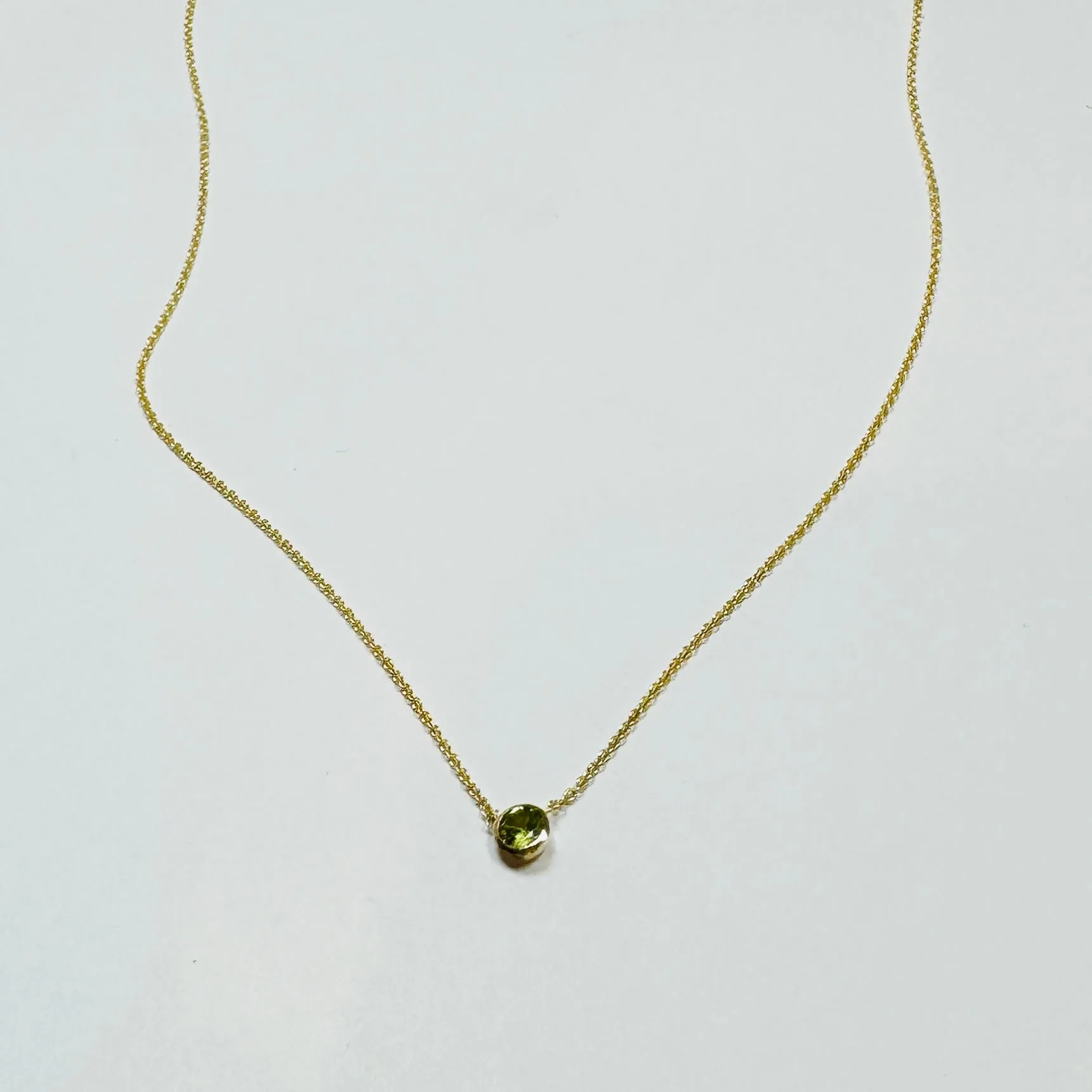 bezel set peridot necklace