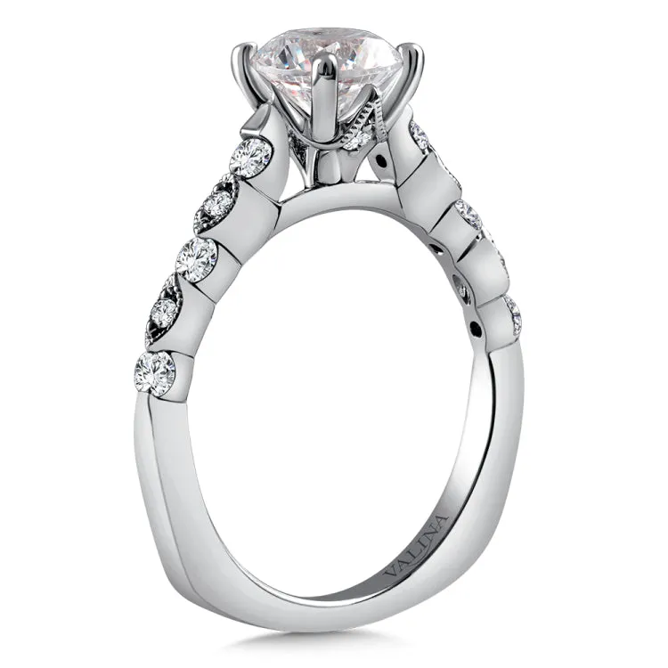 Diamond stackable engagement ring mounting with milgrain detailing and side stones set in 14k white gold.