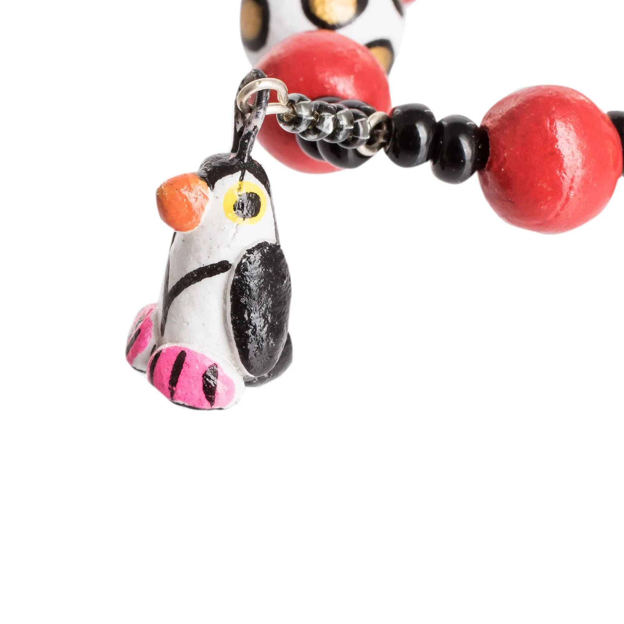 Handcrafted Ceramic Beaded Stretch Bracelet with Penguins - Dangling Penguins | NOVICA